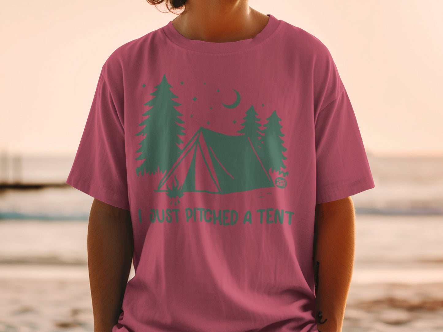 T-shirt with tent, trees, and moon graphic and "I JUST PITCHED A TENT" text.
