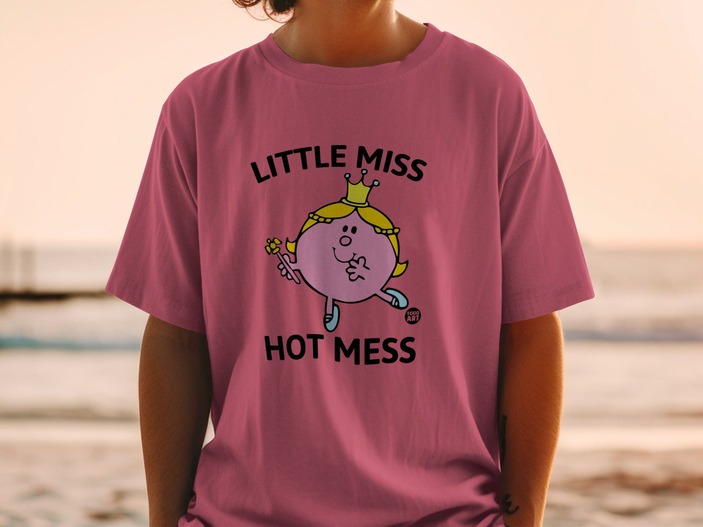 Pink t-shirt with "Little Miss Hot Mess" graphic of a cartoon character.