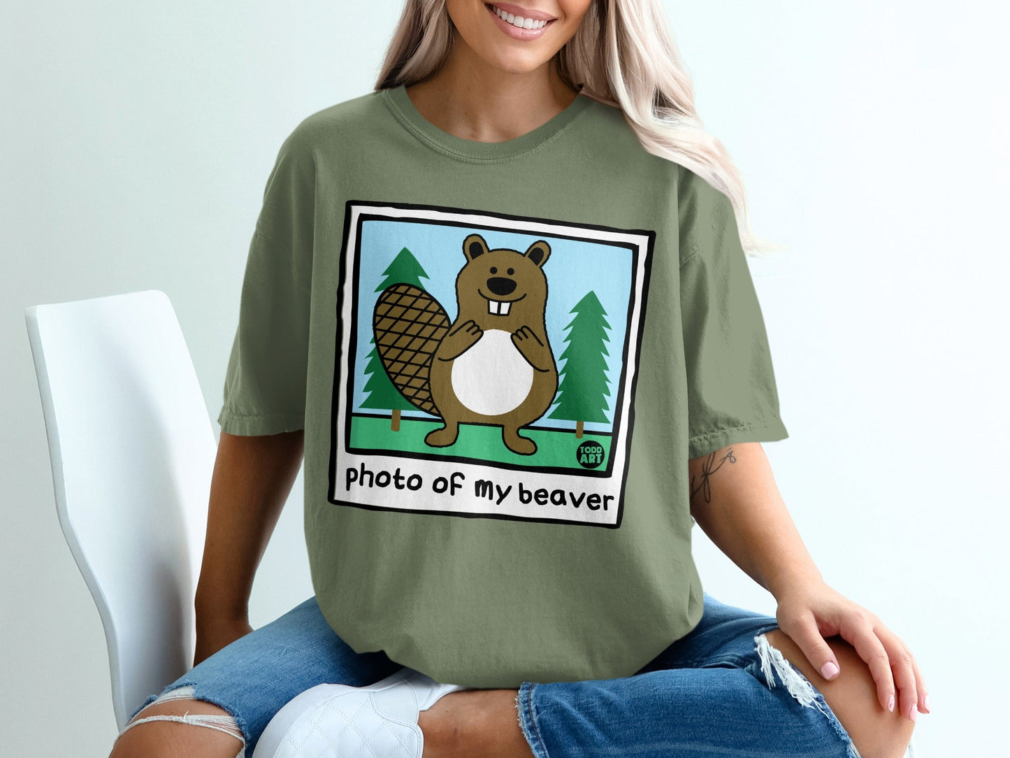 T-shirt featuring a cartoon beaver and the text "photo of my beaver".