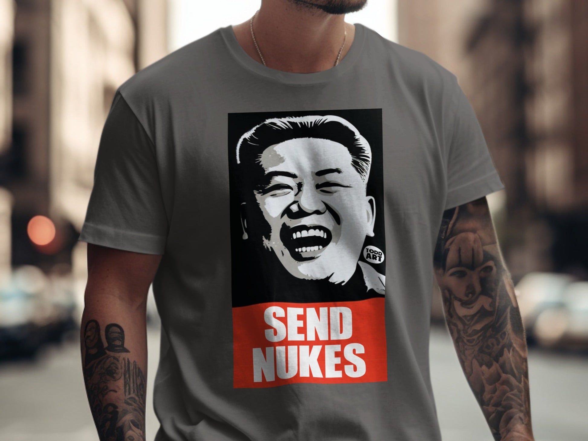 T-shirt with Kim Jong Un's face and "SEND NUKES" text.