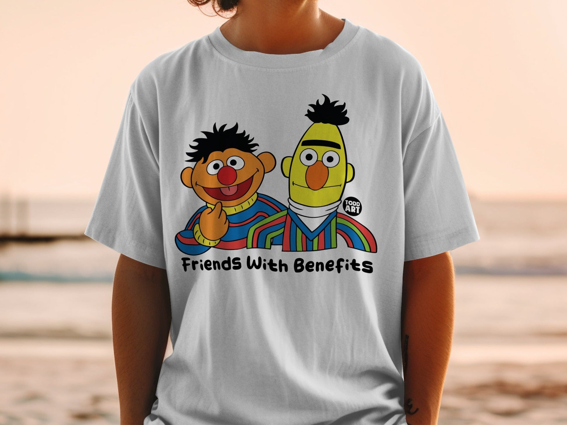 Bert and Ernie on a t-shirt with "Friends With Benefits" text.