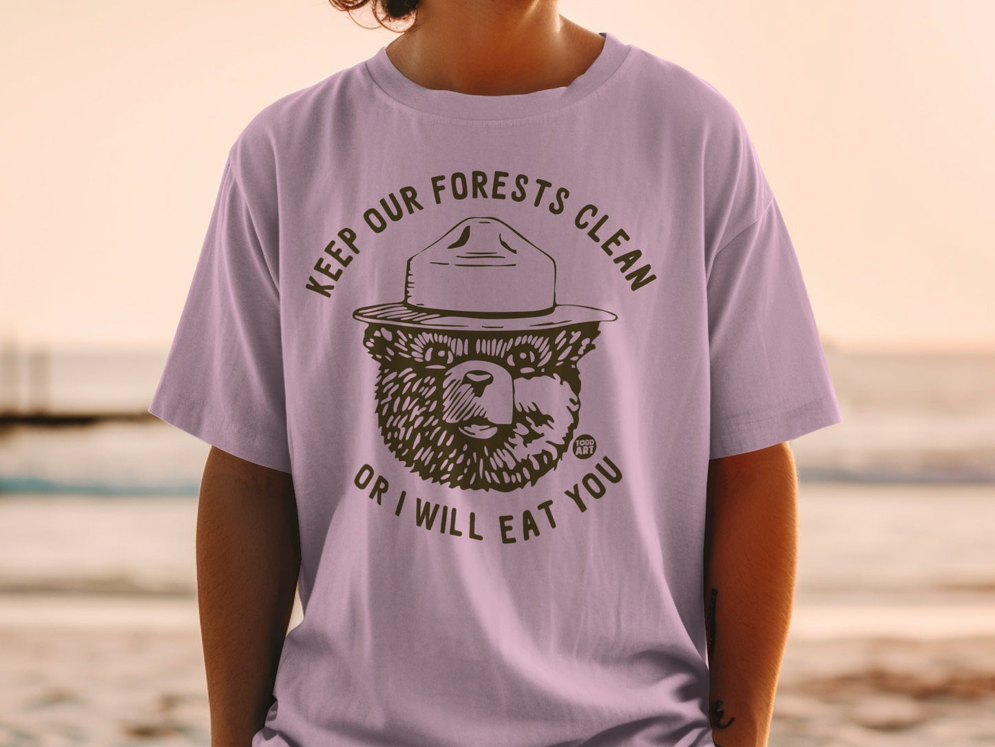 Smokey Bear shirt with "KEEP OUR FORESTS CLEAN OR I WILL EAT YOU" text.