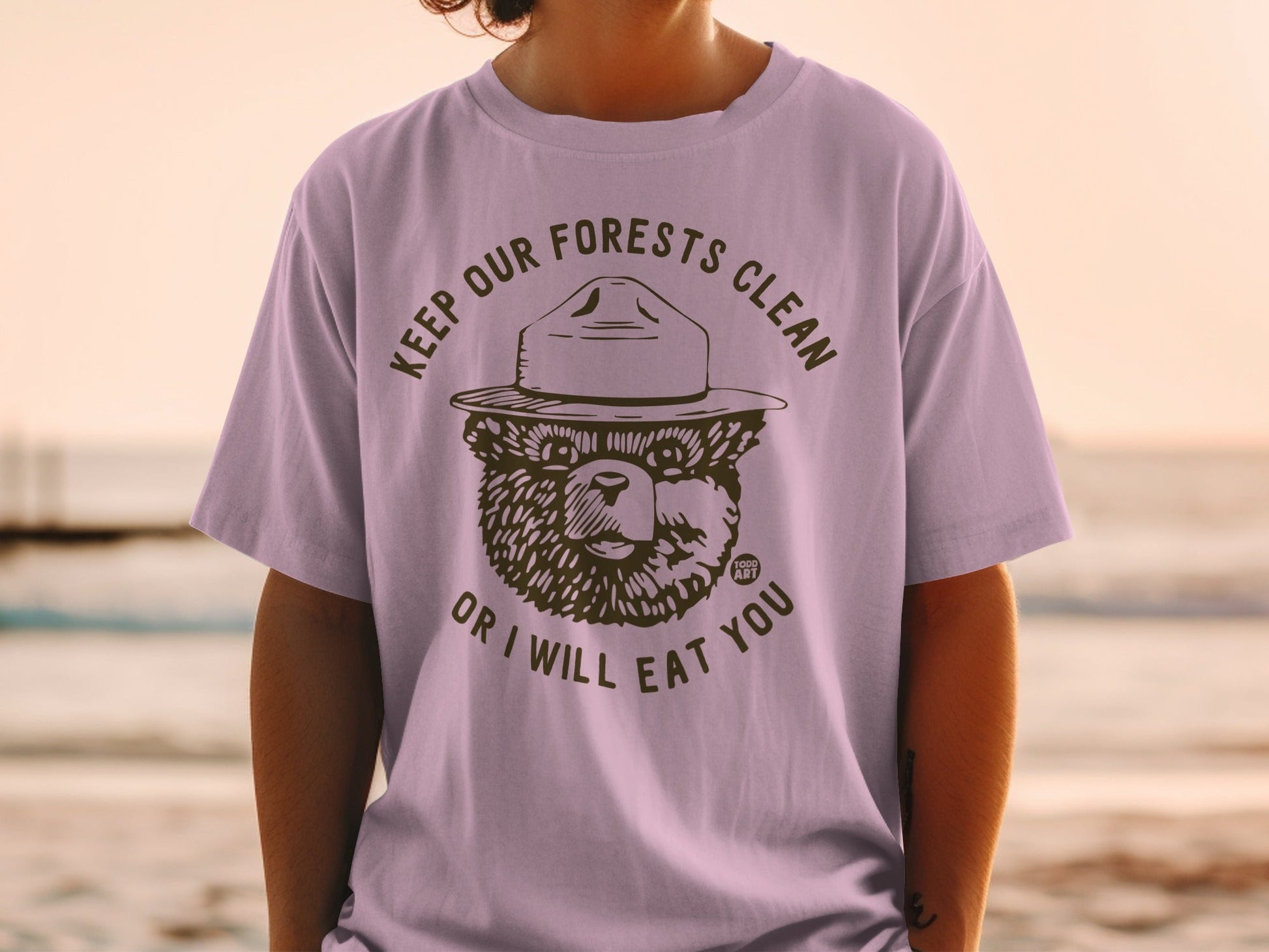 Smokey Bear shirt with "KEEP OUR FORESTS CLEAN OR I WILL EAT YOU" text.