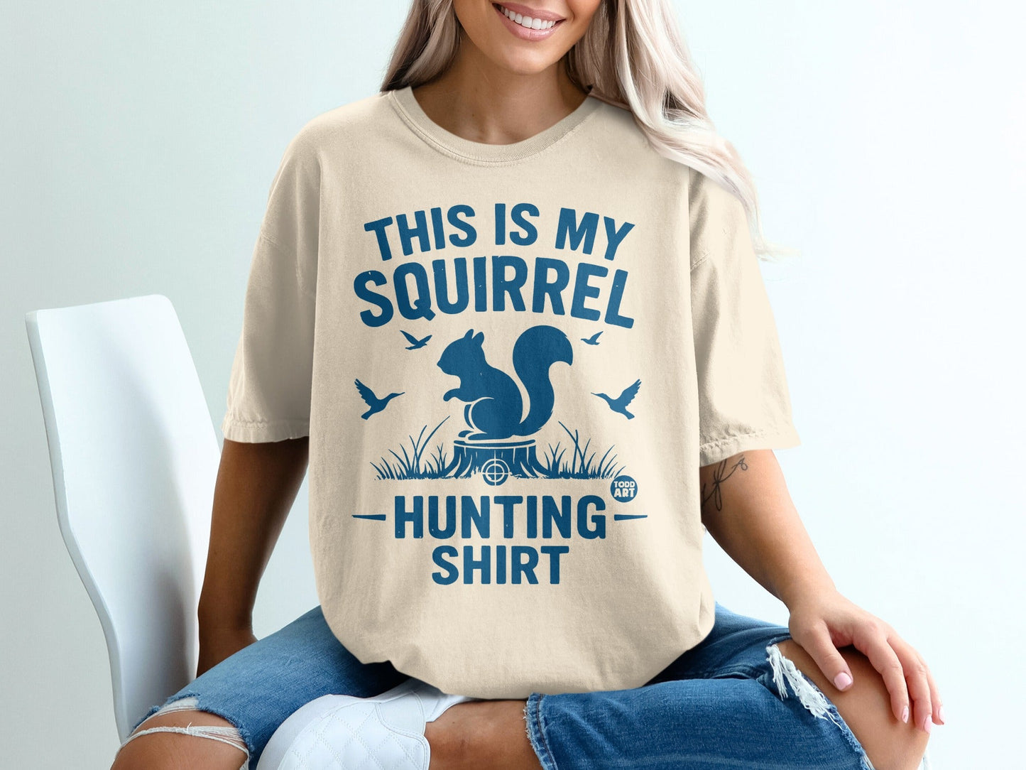 T-shirt with "This is my squirrel hunting shirt" text and squirrel graphic.