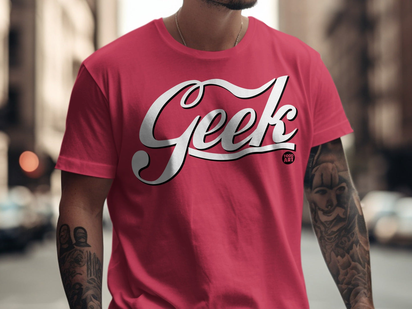 Pink t-shirt with white "Geek" lettering and "Food Art" logo.