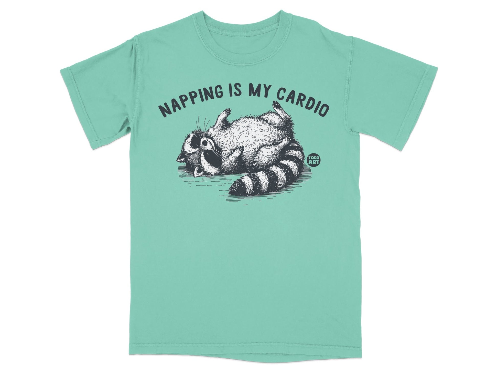T-shirt with raccoon illustration and text "NAPPING IS MY CARDIO".