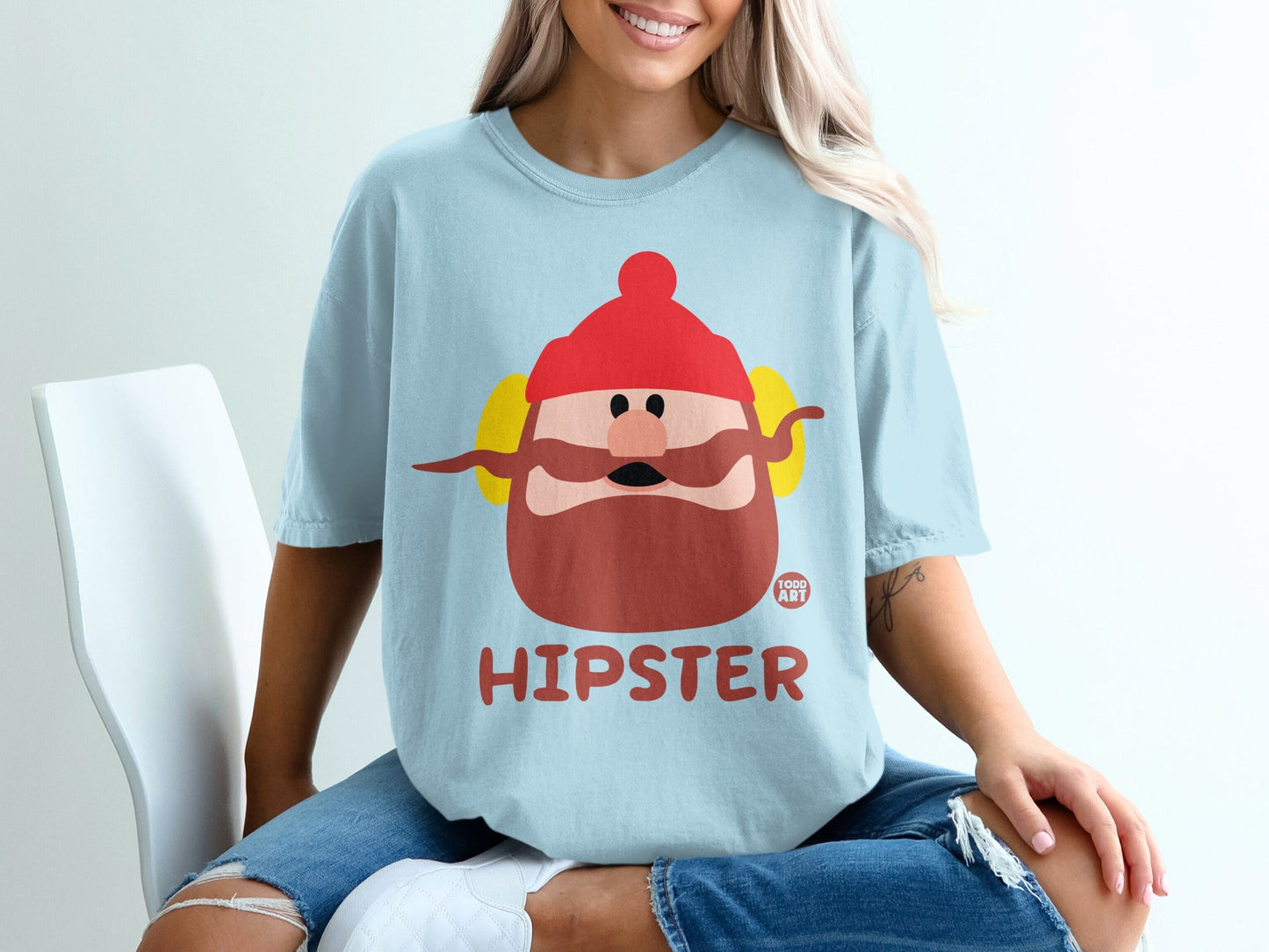 Light blue t-shirt with cartoon hipster character and "TODD ART" text.